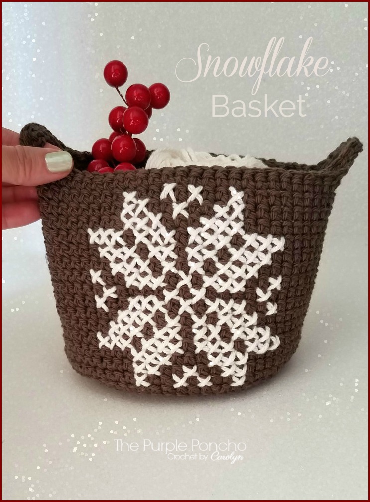 The Snowflake Basket makes a fun gift basket for your festive holiday gifts. Stuff it with some hand towels and an ornament for a nice gift to give and to receive! This small but functional basket is quick to make, and knowledge of counted cross stitch is recommended. Make them in several colors to go with your holiday theme. #crochetbasket #christmasinjuly #snowflake #crossstitch #thepurpleponcho